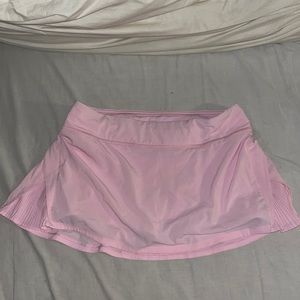 Pink Lululemon skort “Run with Heart” edition